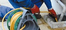 Clearing a drain with hose
